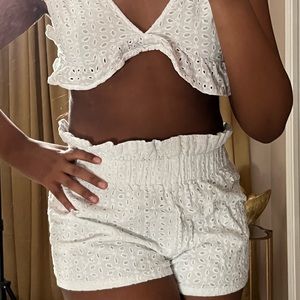 white ruffled cropped short outfit